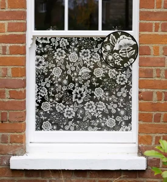 a floral doodle window film with a clear background