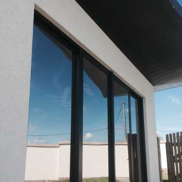 Patio doors with mirrored privacy film
