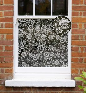 a floral doodle window film with a clear background