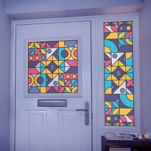 patterned stained glass window film installed on a door
