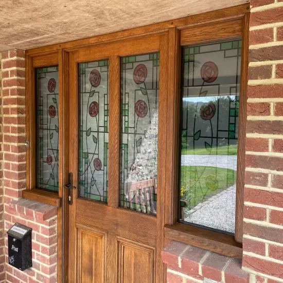 Yoko Rose Stained Glass Window Film Installed Onto A Wooden Front Door And Windows