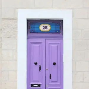 stained glass window film with stars for a witch theme and a central door number