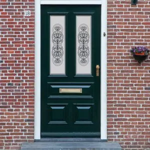 A flower design window film in a Victorian frosted design for a front door