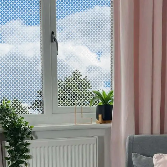 Simple diamond frosted patterned window film installed onto a bedroom window for home privacy