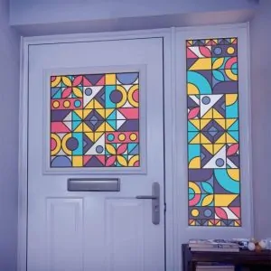 patterned stained glass window film installed on a door