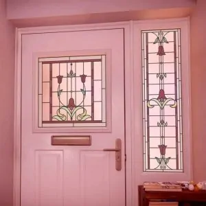 flower stained glass window film installed onto a front door