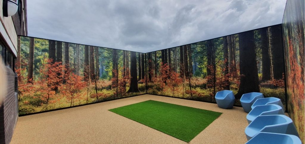 outdoor living room with weatherproof wall murals